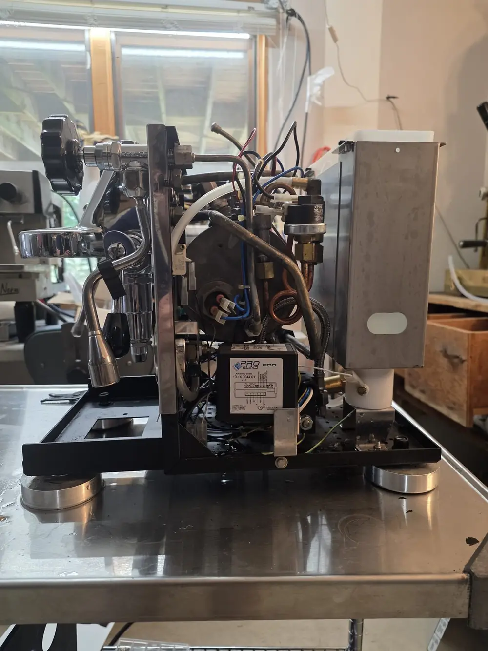 Rocket Appartamento single group espresso machine with boiler head panel opened for electrical repair, Twin Cities, Minnesota
