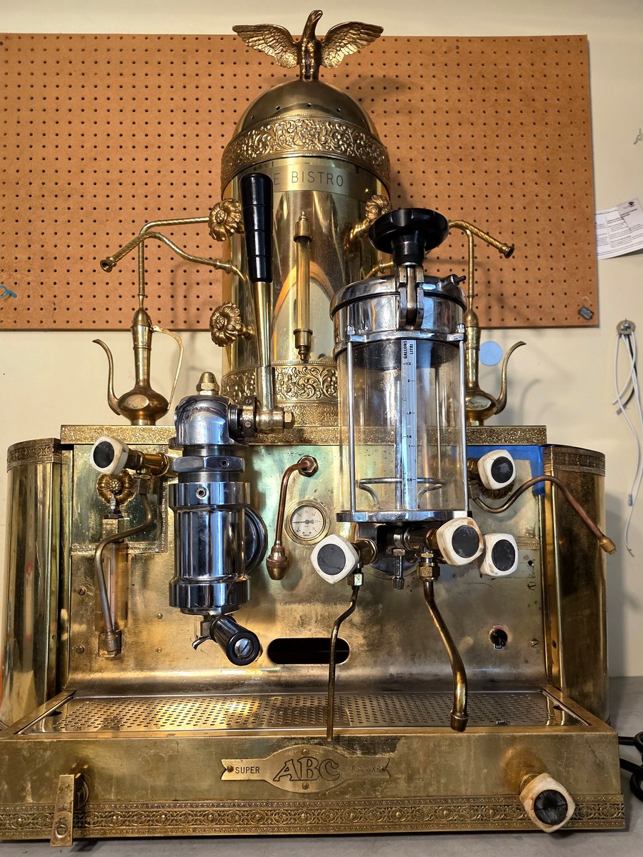Fully restored vintage brass lever espresso machine with dome boiler and eagle finial
