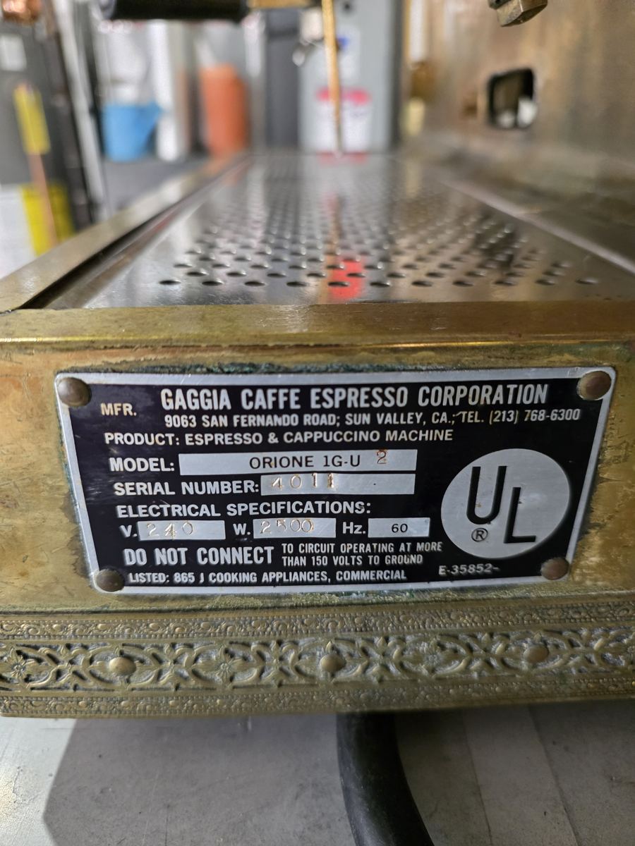 Original Gaggia Caffe Espresso Corporation data plate on a vintage Orione machine